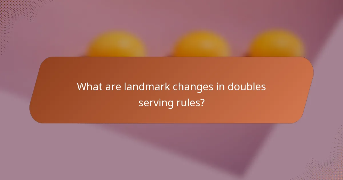 What are landmark changes in doubles serving rules?