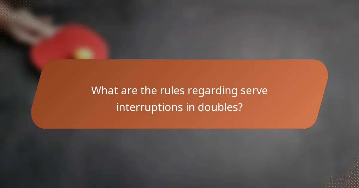 What are the rules regarding serve interruptions in doubles?